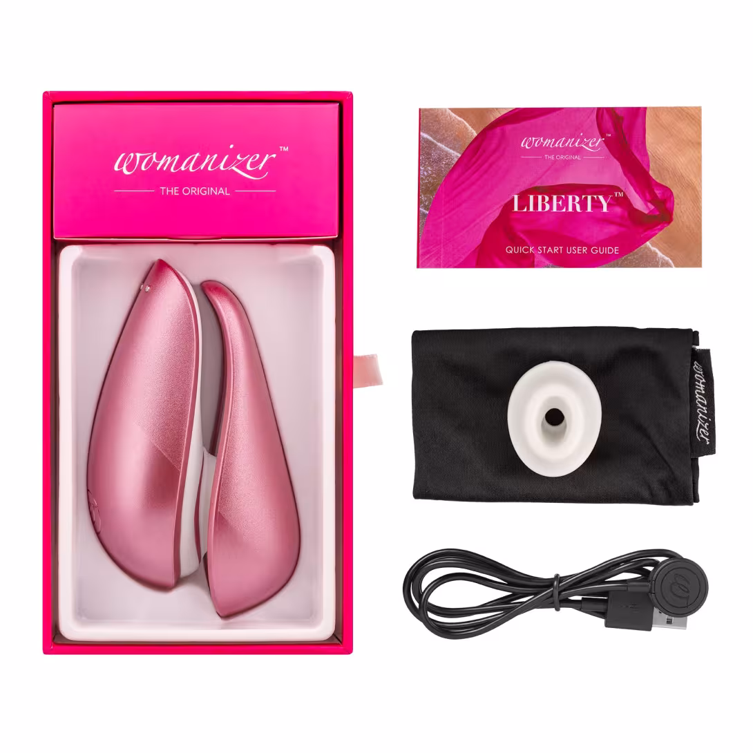 Вакуумний кліторальний стимулятор Womanizer Liberty Pink, магнітна кришка, 2 насадки — фото 6